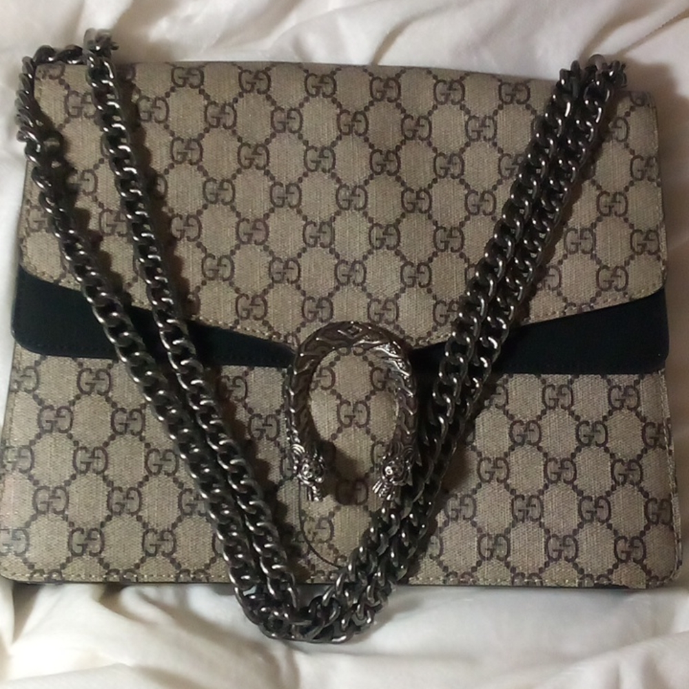 Medium Gucci Dionysus GG logo Black Suede 11in.Lenght 9in.ht.Apox 4 in.depth.